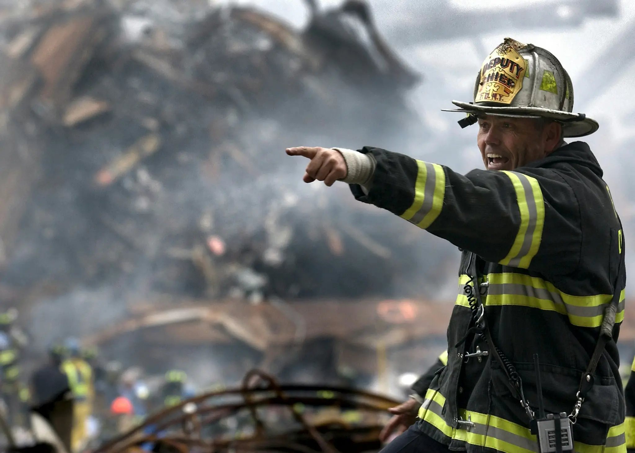 Firefighter working alongside a response team