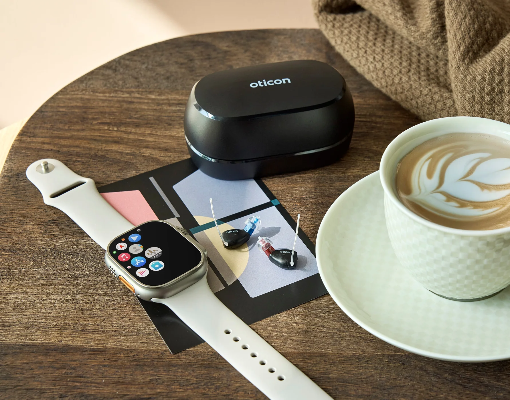 Boise Hears technology visual: Oticon Zeal Still Life Apple Watch Coffee Cup Ms 6066 3Rd Party