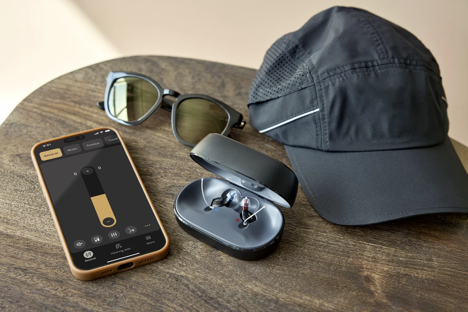 Boise Hears technology visual: Oticon Zeal Lifestyle In Charger With Phone